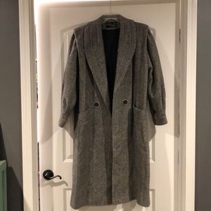 Knee length heavy winter jacket.